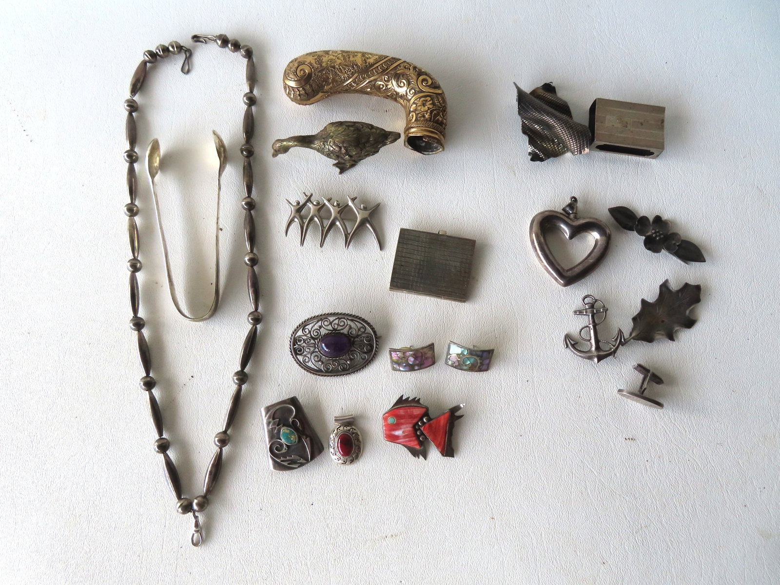 Grouping of decorative collectibles, most sterling. The 7 marked sterling pieces without stones (1 of 9)