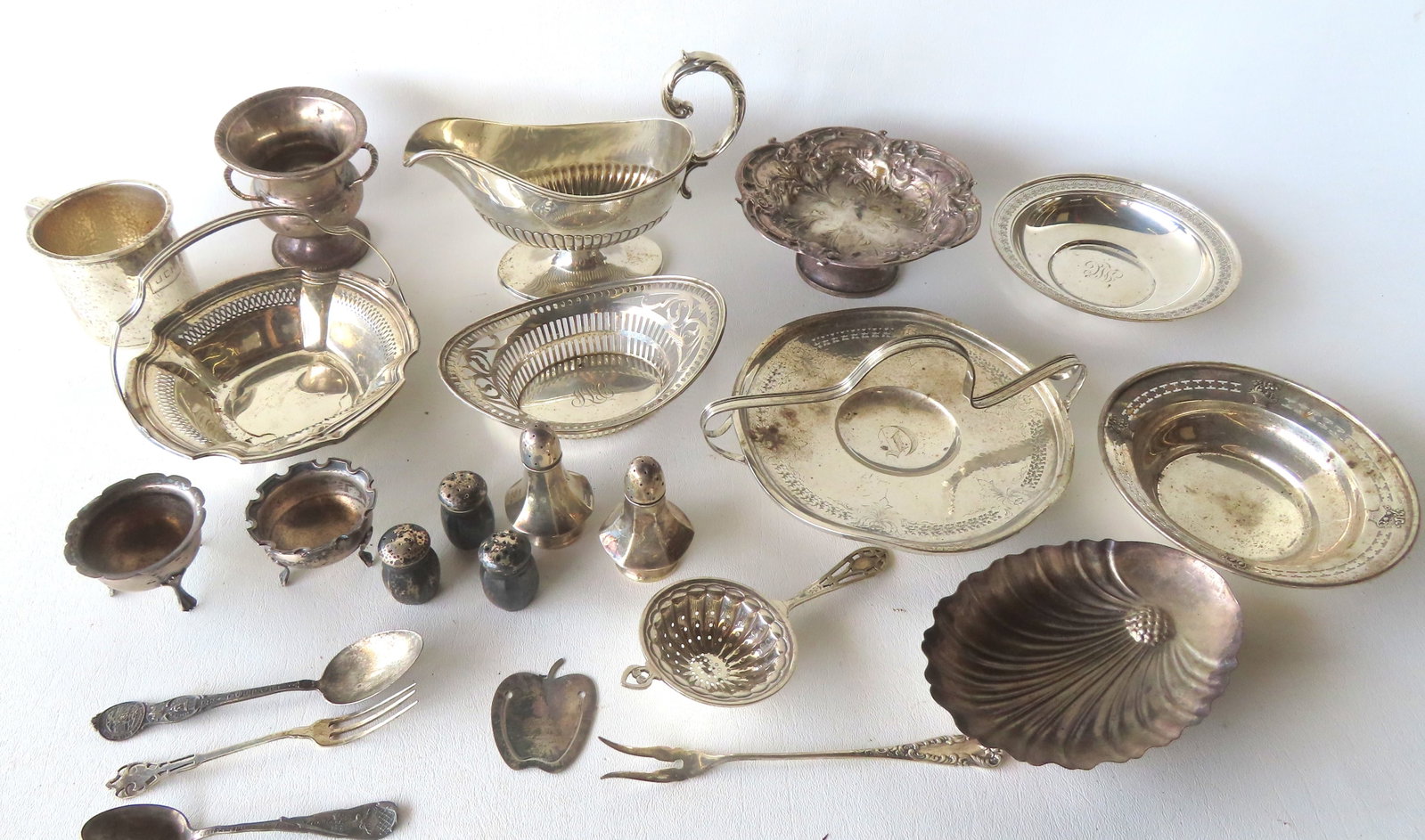A grouping of sterling silver accessories by various makers including a sterling silhouette apple (1 of 7)