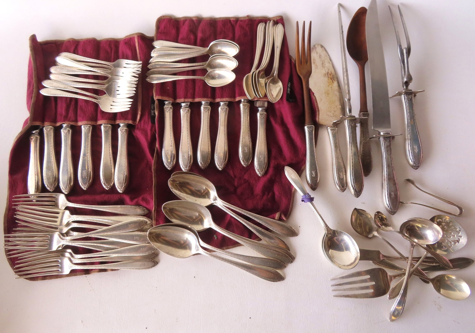 An International Silver Co. Sterling flatware set consisting of 72 pieces including: 11 dinner (1 of 7)