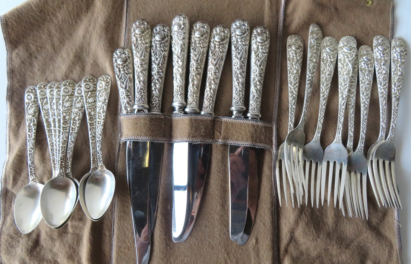 A signed S. Kirk & Son partial flatware set, in ornate floral "Repousse" pattern. Includes 8 (1 of 6)