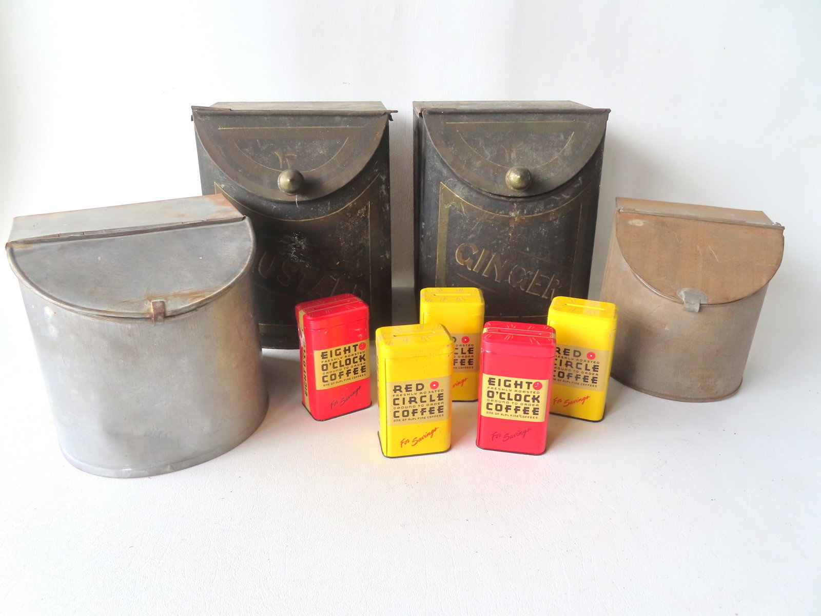 Grouping of advertising tins including: Two original spice bins in original paint stenciled (1 of 7)