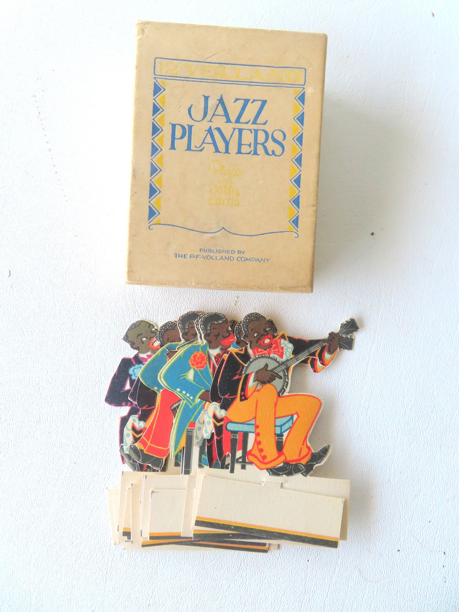 A boxed set of 12 "Jazz Players" die-cut table place cards, published by The P. F. Volland Company, (1 of 8)