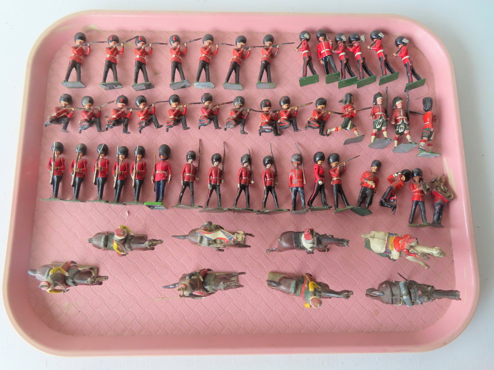 Grouping of 45 miniature and hand painted standing/marching lead soldiers and 8 lead soldiers on (1 of 7)