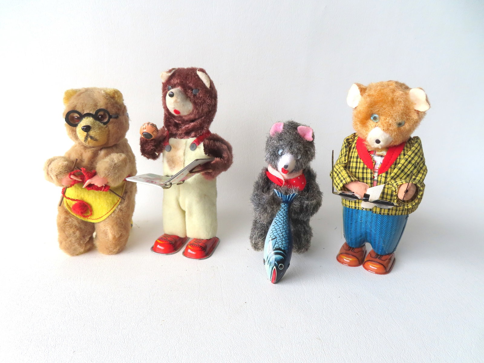 Four Japanese articulated windup bear toys including: Seated mother bear crocheting with moveable (1 of 5)