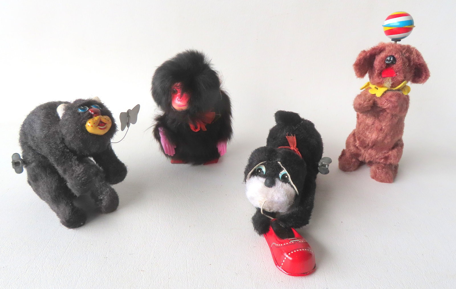 Four Japanese articulated windup toys including: Dancing hairy monkey; dog with moving head (1 of 7)