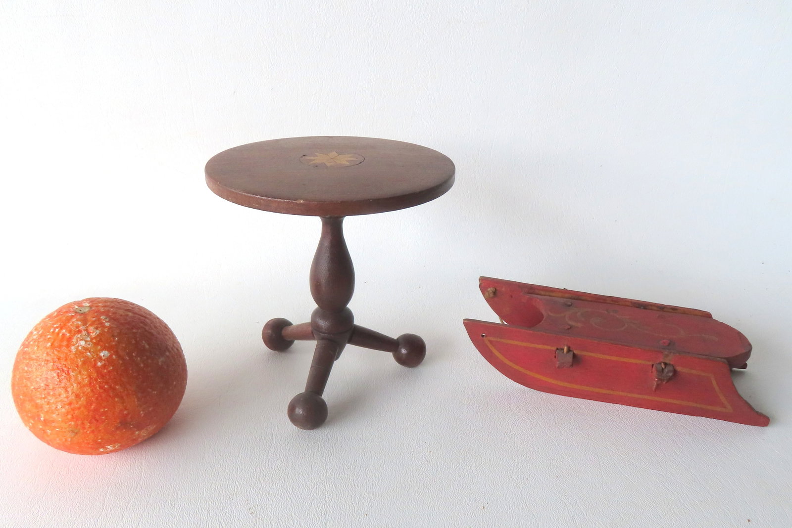 Two early hand made wooden doll-size toys in original paint including a tea table with star inlay on (1 of 6)