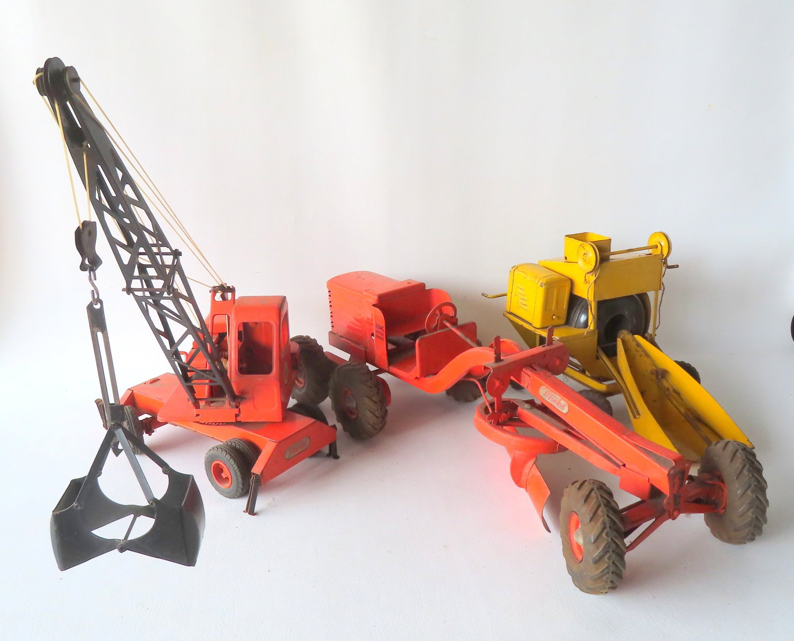 Three pressed steel "Model Toys" vehicles in original paint, including: Adams Motor Grader - good (1 of 18)