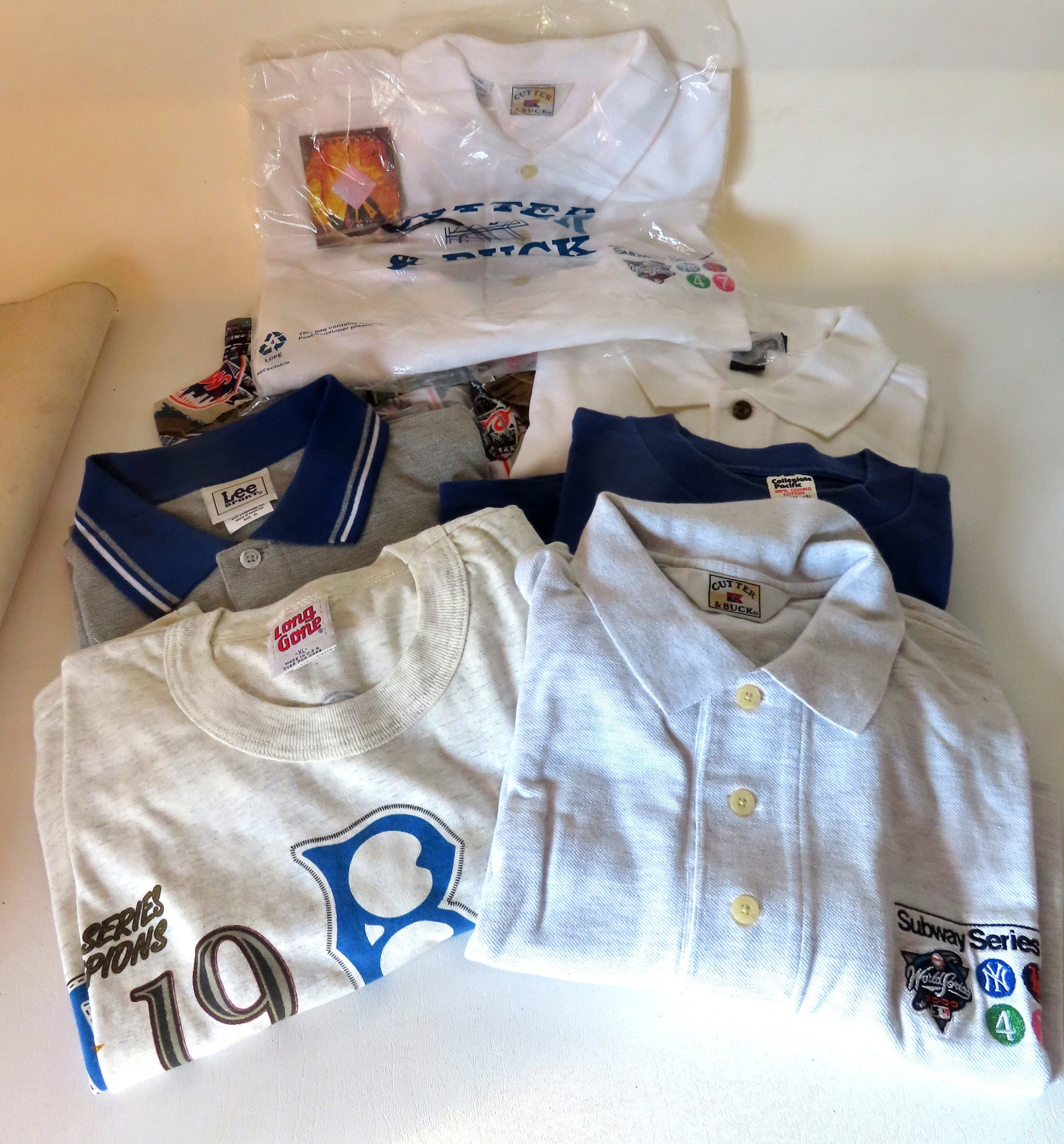 Grouping of 7 casual sporting related shirts, some unused, all XL size. Includes NY Yankees & Mets (1 of 12)