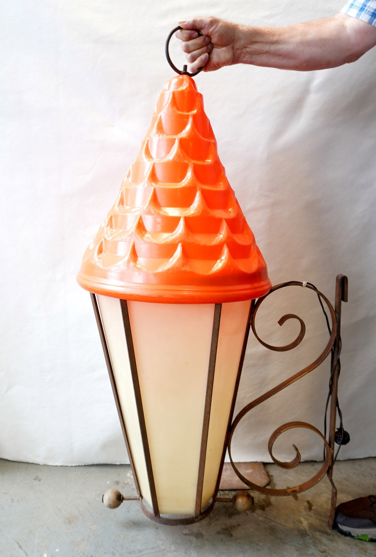 A Restaurant octagonal shaped building light fixture with a stepped cone shaped orange roof with sha: A Restaurant octagonal shaped building light fixture with a stepped cone shaped orange roof with shaped shingles and tapered paneled sides - the lighting device appears to be constructed of fibergass 