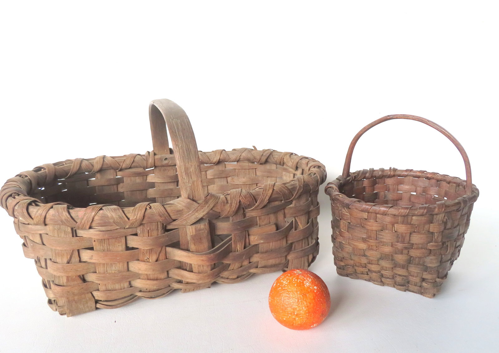 Two primitive late 19th century baskets. (1 of 14)