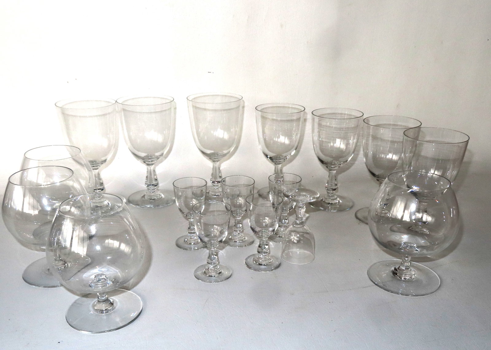 A set of 16 marked "Baccarat France" stemware pieces. All in very good condition without damage. The (1 of 9)