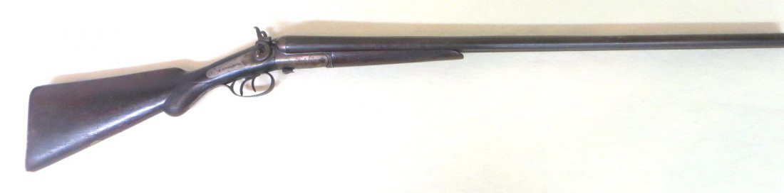 Old double barrel shotgun with hammers signed W. Richar: Old double barrel shotgun with hammers signed W. Richards, walnut stock, damascus barrel. Barrel length 30".