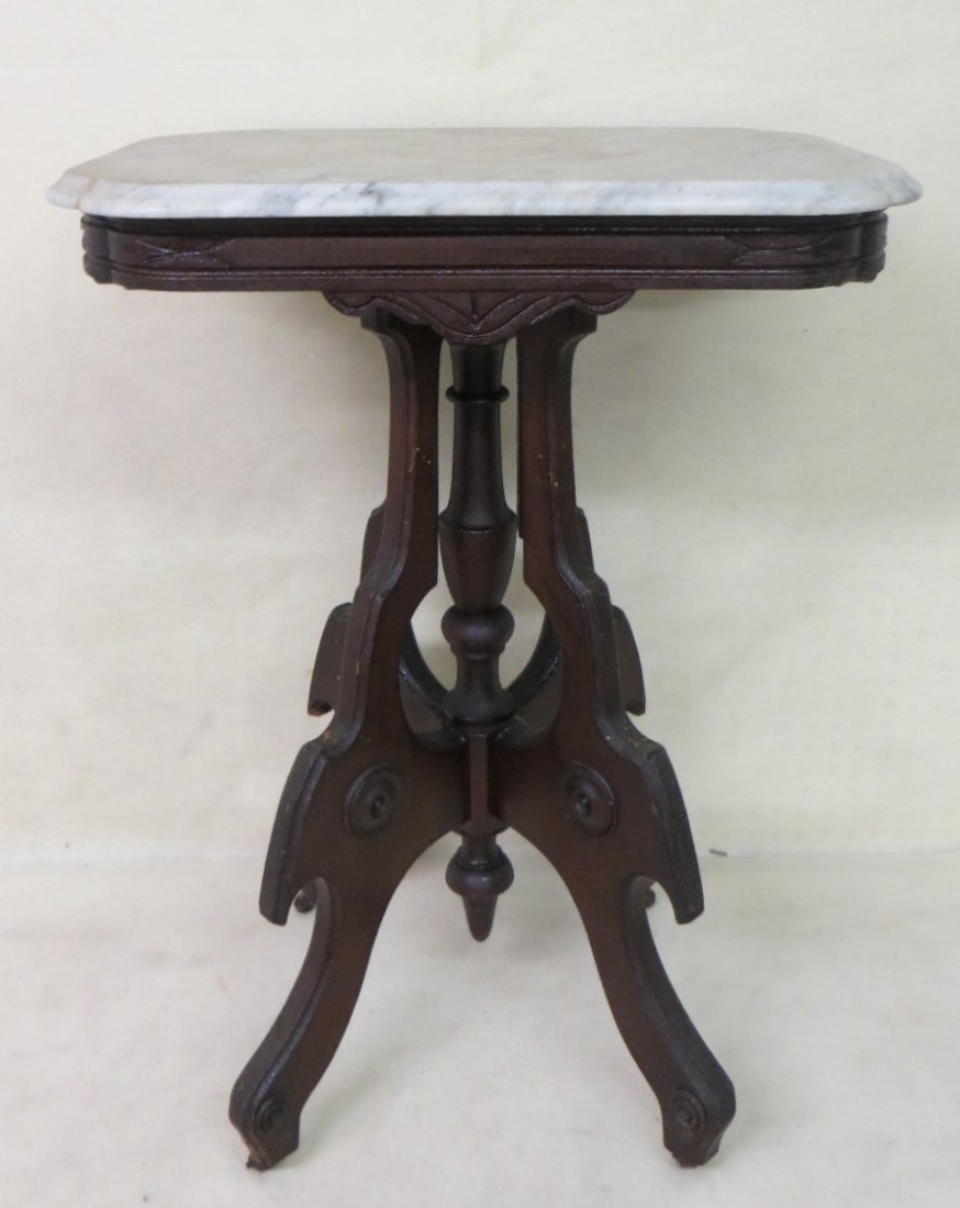 Two Victorian marble top stands, one rectangular (small: Two Victorian marble top stands, one rectangular (small 8" hairline in top) and one oval (the latter being cut down to coffee table size).