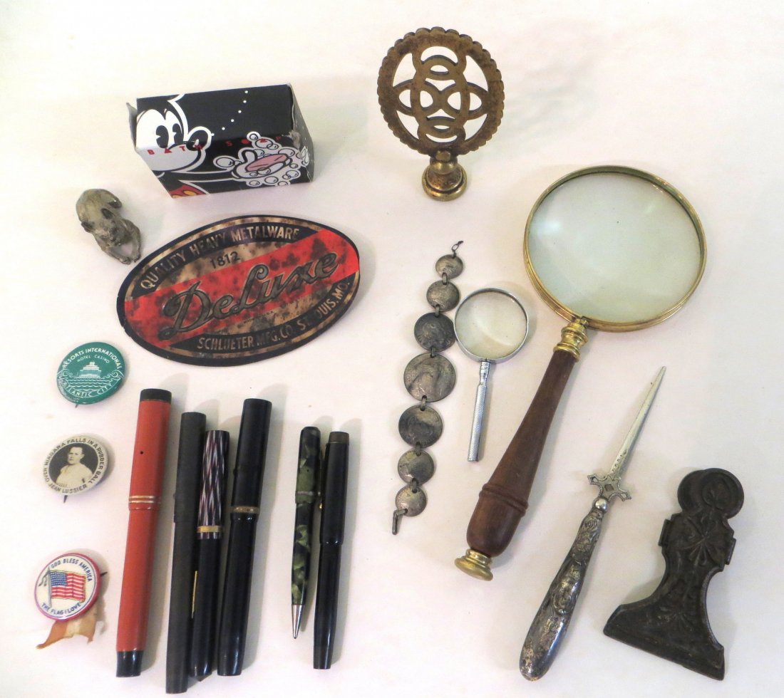 Lot of collectibles including coin silver bracelet, sev: Lot of collectibles including coin silver bracelet, several old fountain pens, fancy magnifying glass, Victorian iron paper holder, letter opener, pinback of Jean Lussier (over the Niagara Fall in a r