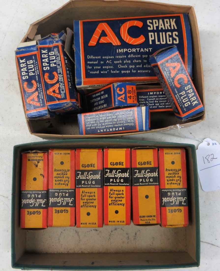 Collection of 20 AC spark plugs in original boxes and 6: Collection of 20 AC spark plugs in original boxes and 6 Globe spark plugs in original boxes. Circa 1950-60.