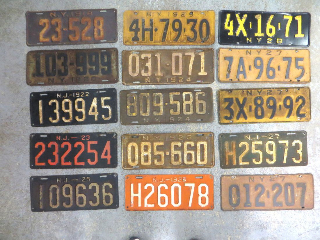 Fifteen New Jersey and New York plates dates ranging fr: Fifteen New Jersey and New York plates dates ranging from 1918 to 1928 all in original paint.
