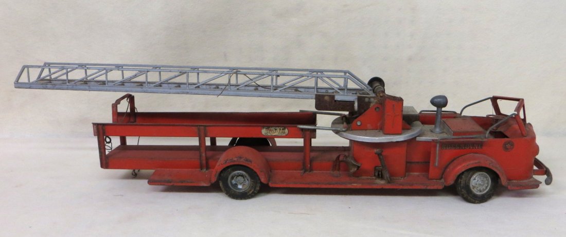 Signed Model Toys Rossmoyne fire truck - missing extens: Signed Model Toys Rossmoyne fire truck - missing extension ladder, some rust spots - 33"L.