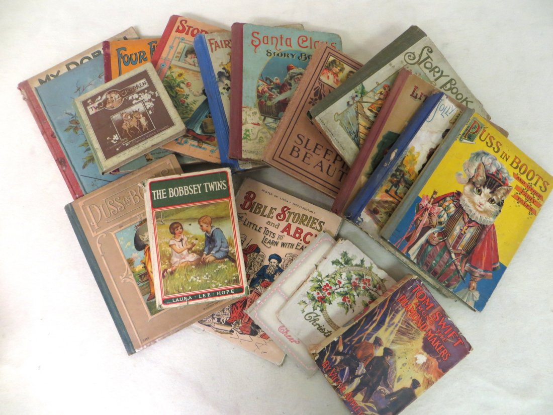Collection of old children's books including Santa Clau: Collection of old children's books including Santa Claus Story Book, Puss in Boots by McLoughlin Bros., Bobbsey Twins, Sleeping Beauty by Graham and Matlock, other McLoughlin Bros. and older books.