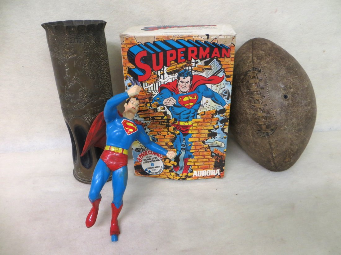 Collection of miscellaneous articles including old foot: Collection of miscellaneous articles including old football, Marx tin trains, Superman Aurora model, trench art shell engraved Souvenir from Holland 1944, etc.