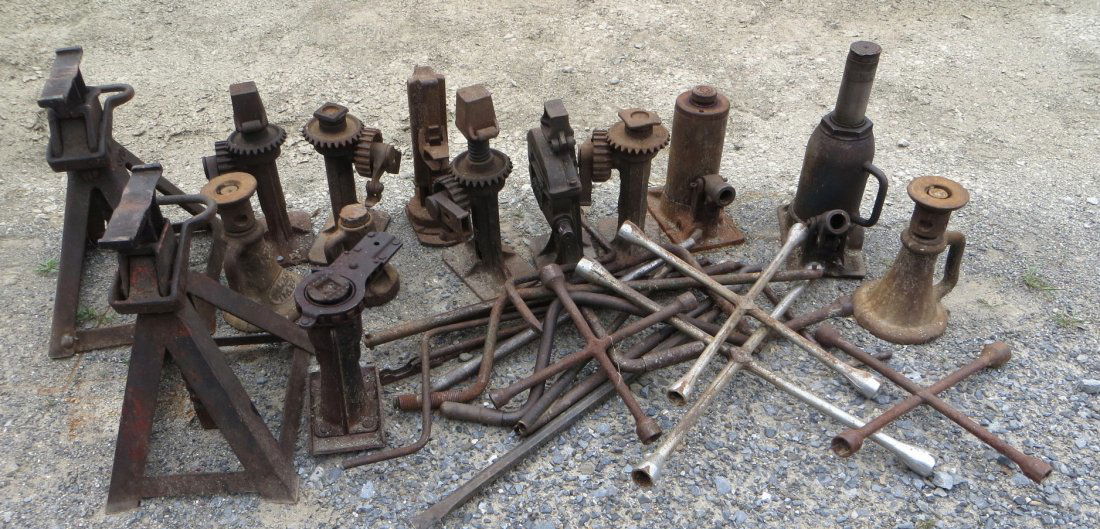 Large Lot of Automobile Jacks: Lot of 12 automobile Jacks including Rees & H&B, 2 to 12 ton, bottle and ratchet type, and two 5 ton floor stands.