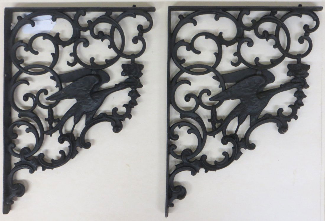 Pair of cast iron shelf brackets with Phoenix bird reti: Pair of cast iron shelf brackets with Phoenix bird reticulated design on each panel - newer black paint - 19th century - 16.25" x 11.75".