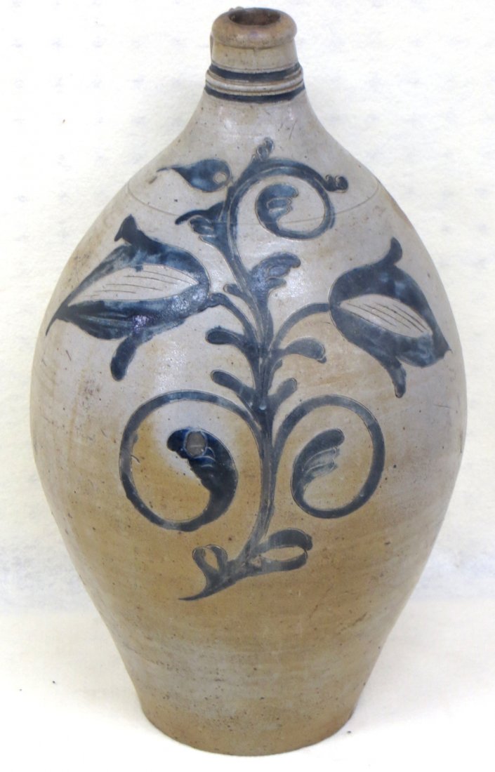 Westerwald stoneware 3 gal. ovoid jug with large deep b: Westerwald stoneware 3 gal. ovoid jug with large deep blue incised double flower design - fluted handle with blue decoration at base - double incised blue rings around spout - excellent condition - pr