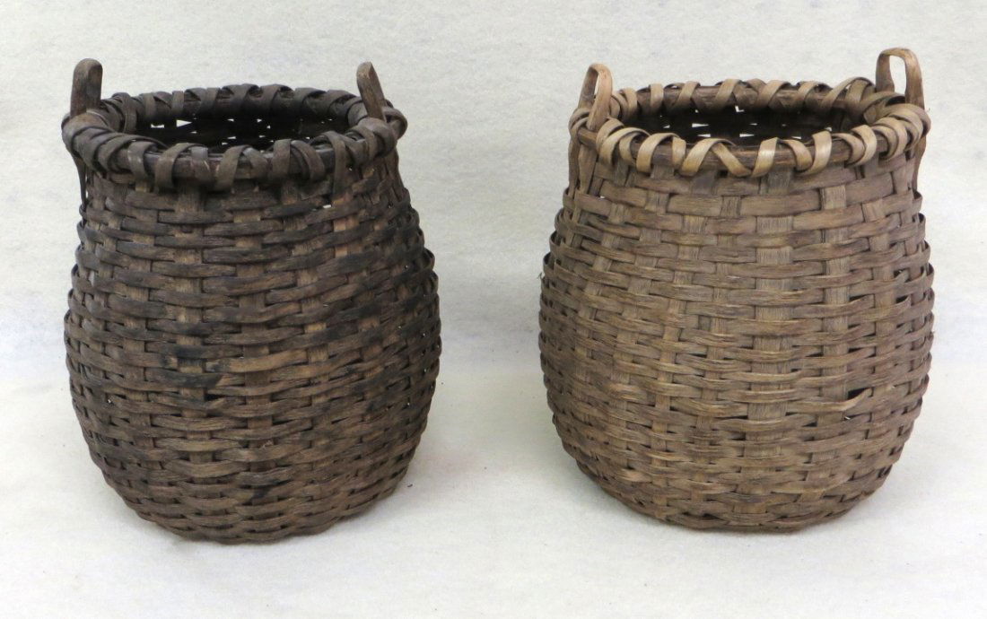 Two small Taconic berry baskets with double handles - b: Two small Taconic berry baskets with double handles - both in excellent condition with old patina - 7"H x 5"D & 7"H x 4.5"D.