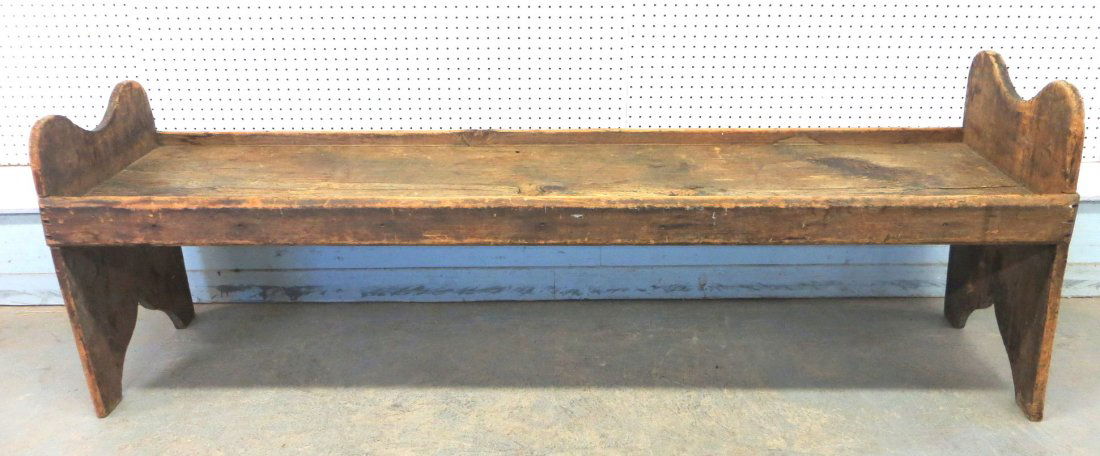 Large wooden bench or low work table with traces of gre: Large wooden bench or low work table with traces of green paint - Pennsylvania origin. Early 19th century - cutout sides. 75.75"L x 18.5"D x 27"H (highest point).