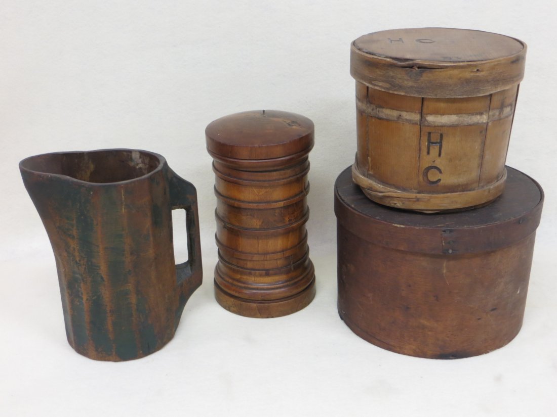 Four treenware items including hand carved pitcher in o: Four treenware items including hand carved pitcher in old green paint, 2 pantry boxes (one signed HC and missing band), and a towered, sectional spice box with 6 compartments - each section with wood