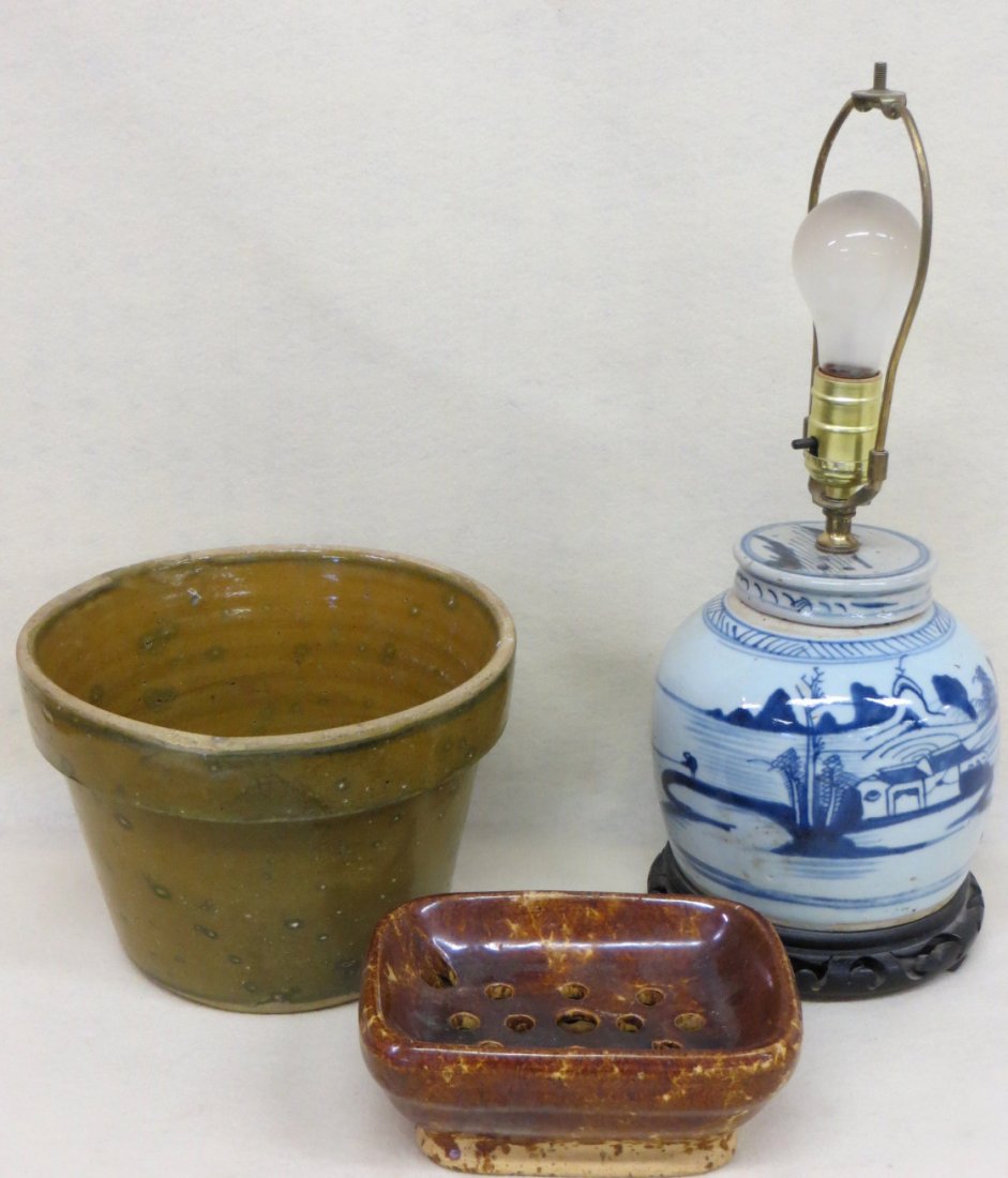 Three pieces of country earthenware including stoneware: Three pieces of country earthenware including stoneware flower pot in green glaze, Rockingham soap dish and an early Chinese export ginger jar converted to lamp.