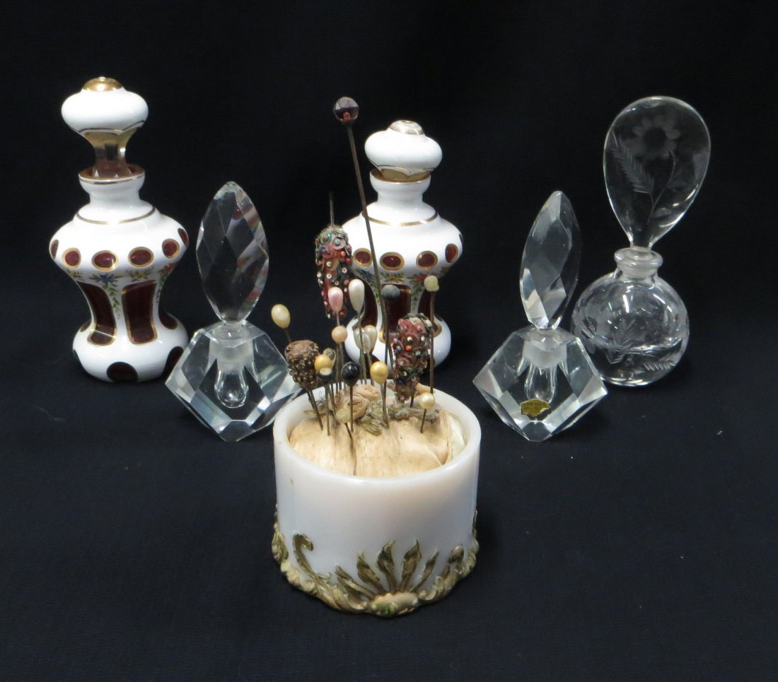 Collection of 6 dresser articles including 2 white: Collection of 6 dresser articles including 2 white Bohemian cut to red crystal dresser bottles (one with damaged stopper); 2 matching crystal perfume bottles (paper label signed Japan), plus an unsign