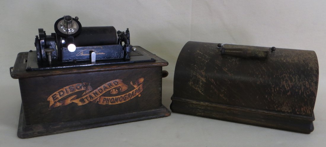 Edison "Standard" Model C cylinder phonograph with oak: Edison "Standard" Model C cylinder phonograph with oak carrying case - good working condition - no horn - comes with 50 cylinders which appear to be in good condition.
