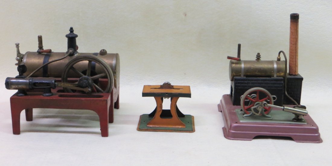 Three old tin and iron machine models including 2 steam: Three old tin and iron machine models including 2 steam engines and 1 belt driven saw signed Weedon, all in original paint.