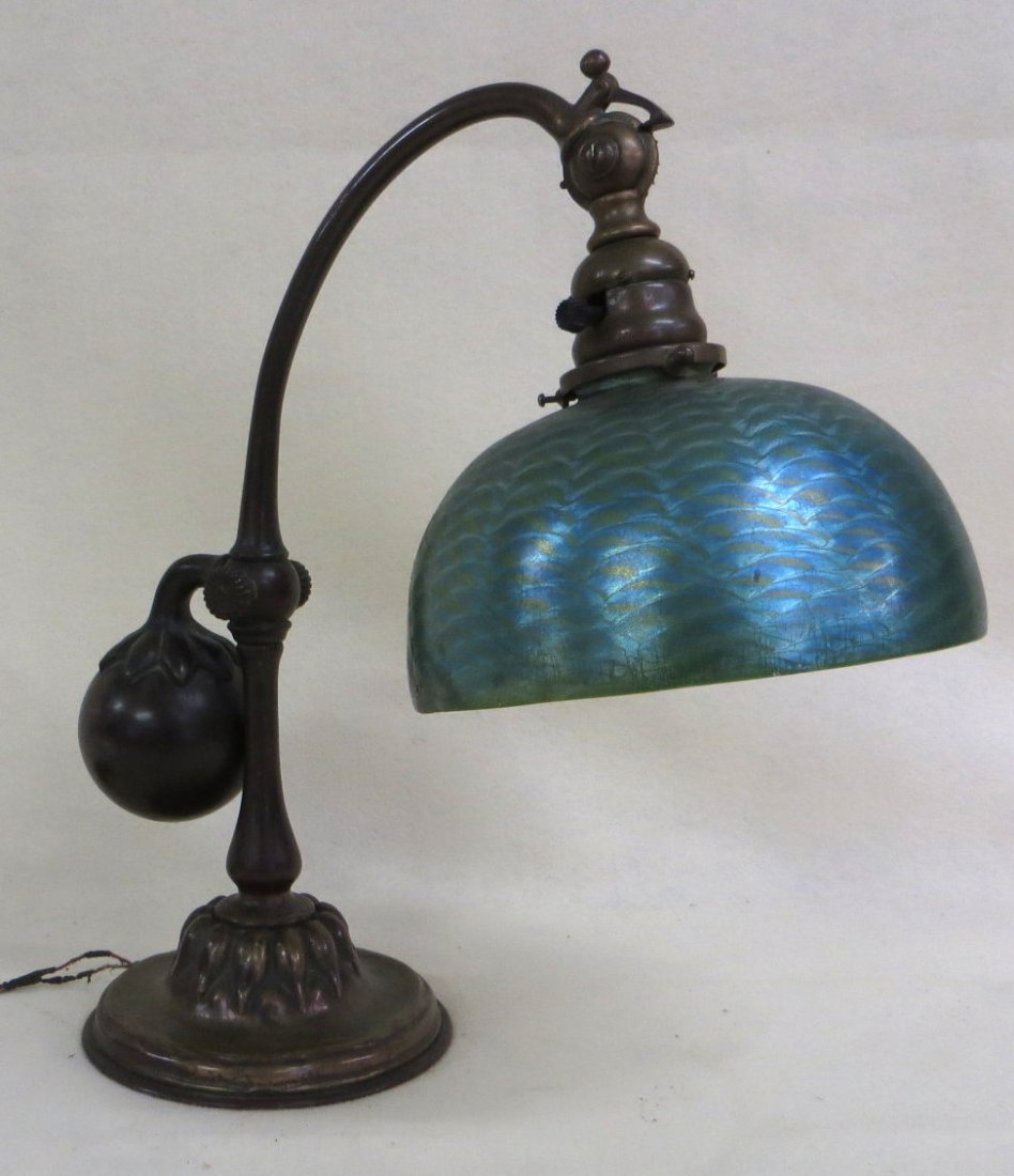 Tiffany counter weight bronze desk lamp - base signed: Tiffany counter weight bronze desk lamp - base signed Tiffany Studios NY 415 and is in original condition with good patina. Shade signed L.C.T. Favrille. Lamp 15.5"H - Diameter of shade 8" - Note that