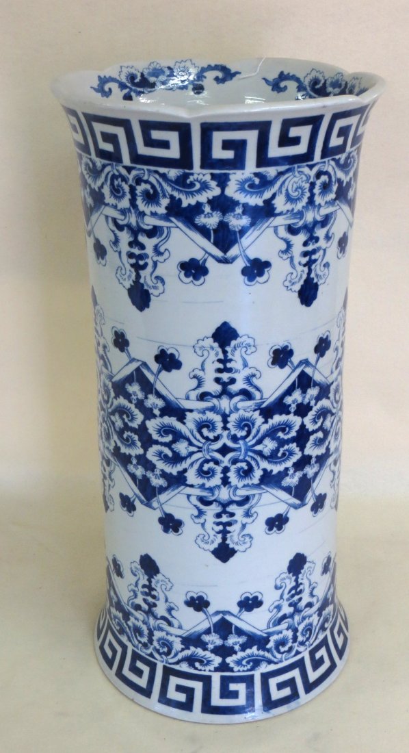 Oriental hand painted blue and white porcelain umbrella: Oriental hand painted blue and white porcelain umbrella stand - 24.25"H x 11.5"D. Oriental stamp on base. Probably early 19th century. Excellent condition.
