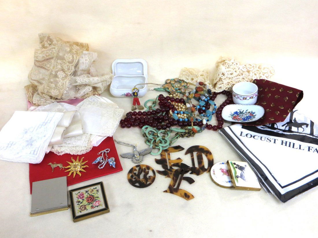 Lot of miscellaneous lady's articles including 4: Lot of miscellaneous lady's articles including 4 compacts, costume jewelry including Trifari earrings, scarves, gloves, French lace, Christian Dior silk bag, 4 tortoise shell-like letters, etc. Lot al
