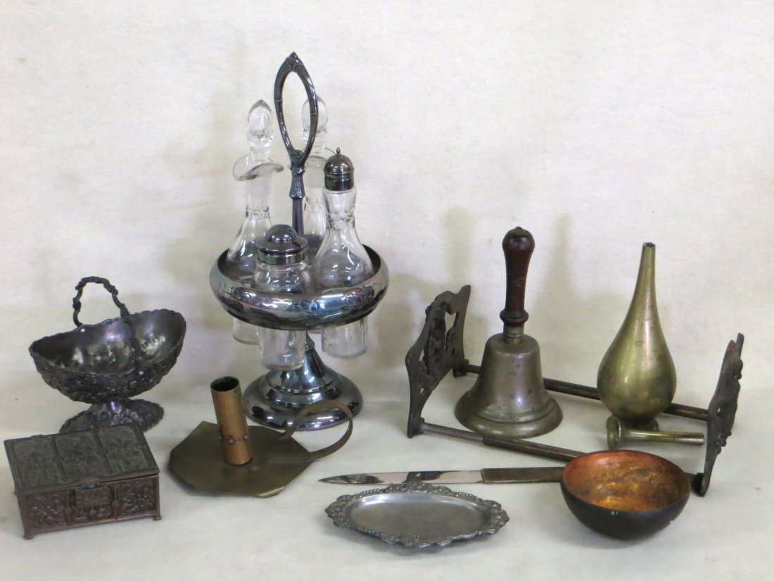 Collection of metal objects including a Victorian: Collection of metal objects including a Victorian silver plate condiment set with etched bottles, arts & crafts copper chamber stick, bronzed coated metal trinket box decorated with religious figures,