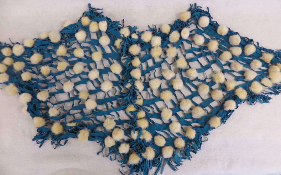 Custom made blue suede shawl with mink decorations: Custom made blue suede shawl with mink decorations signed in pen and ink within a red triangle (illegible signature) New York. Provenance: From a private collection of a retired NYC theatrical profess