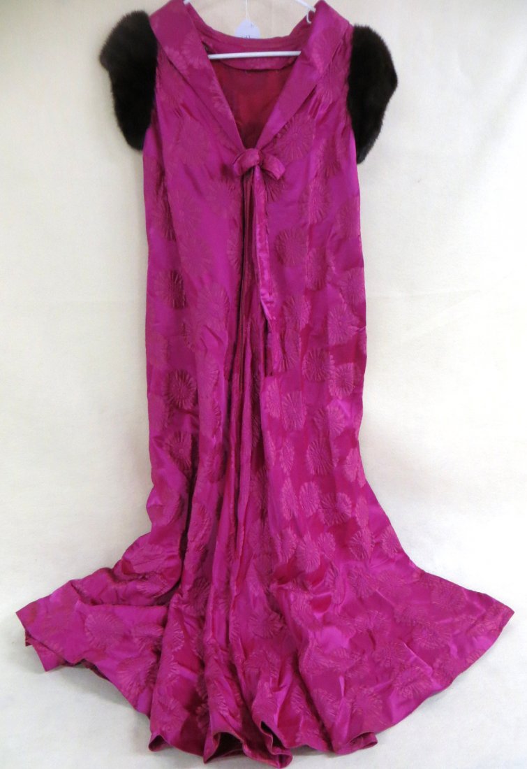 Formal pink dress decorated with quilted flowers with: Formal pink dress decorated with quilted flowers with mink arm cuffs labeled Bergdorf Goodman - probably medium size. Provenance: From a private collection of a retired NYC theatrical professional.