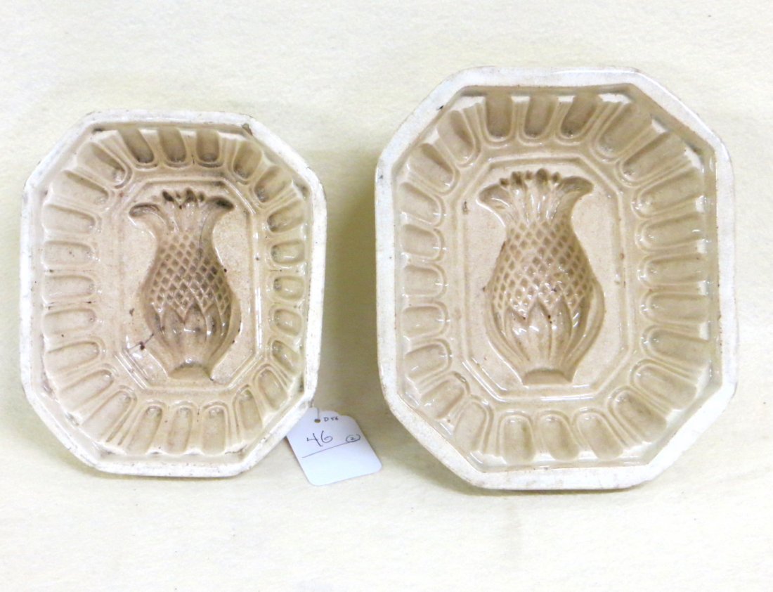 Two ironstone Jello molds in pineapple pattern. One: Two ironstone Jello molds in pineapple pattern. One with several minor chips hardly noticeable.