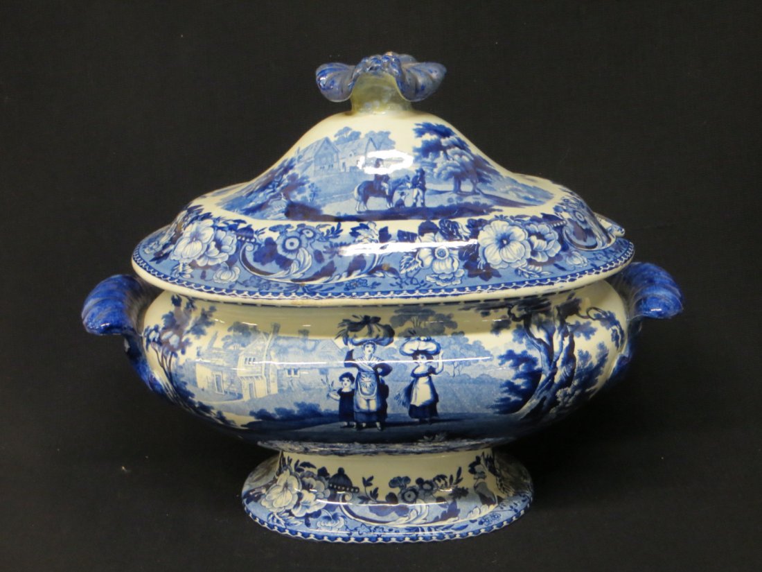 Large Staffordshire blue and white transferware soup: Large Staffordshire blue and white transferware soup tureen with double handle, pedestal base - pattern "Rural Scenery" - restored finial on lid with stapled repair - base appears to be in good condit