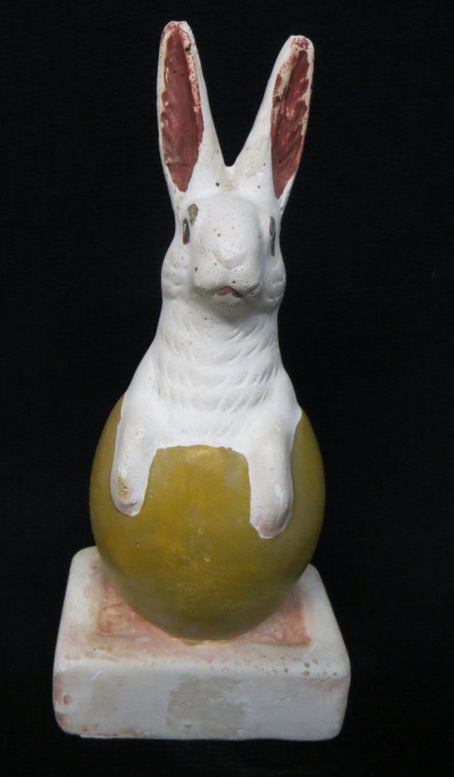 Chalkware figure of a rabbit hatching from egg.: Chalkware figure of a rabbit hatching from egg in original paint - excellent condition - 6.25"H.