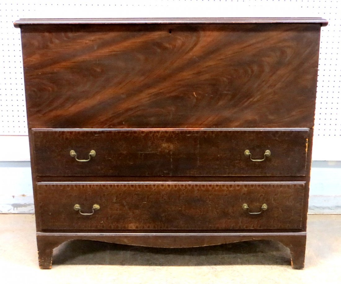 Good grain painted blanket box in red and black paint: Good grain painted blanket box in red and black paint with 2 lower drawers with bale handles on cutout base - molded top edge and drawer fronts - repair to back leg but otherwise excellent condition 3