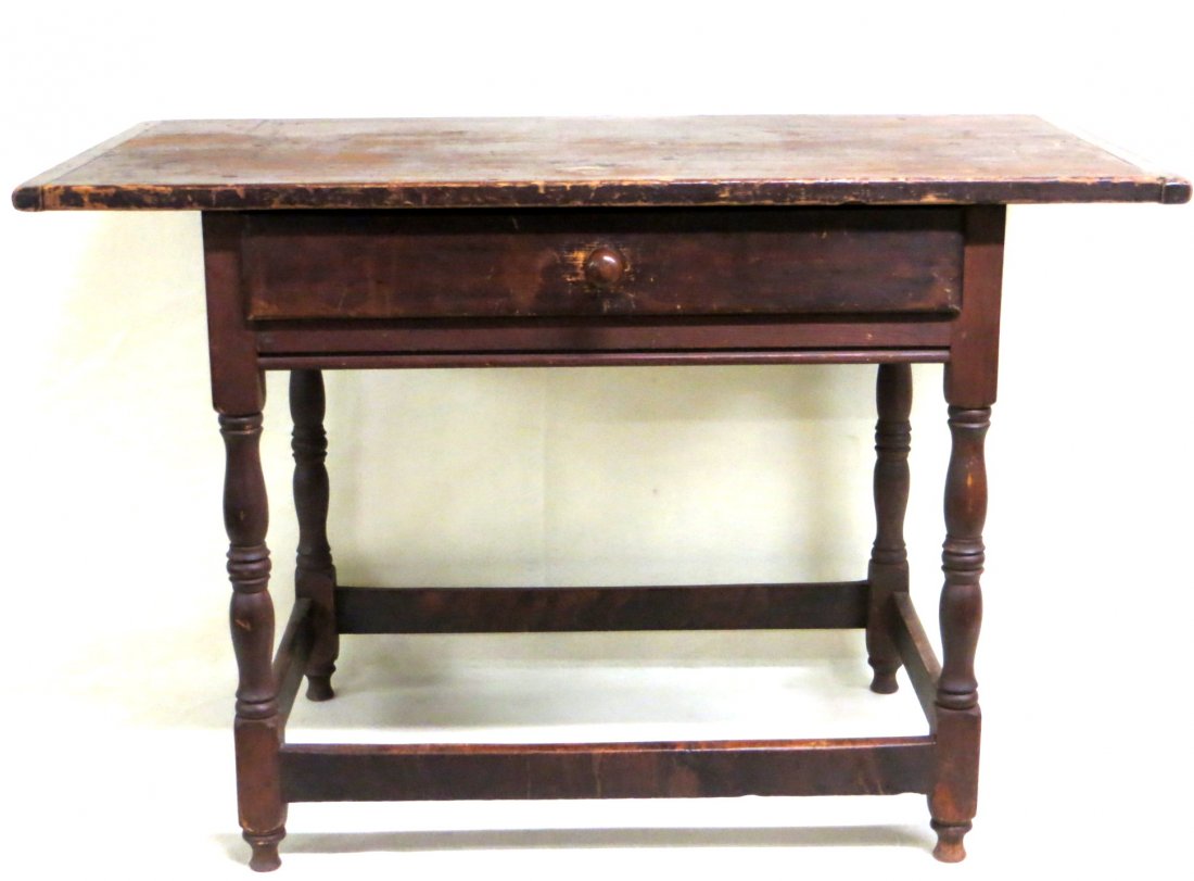 Tavern table with center drawer in original red stain,: Tavern table with center drawer in original red stain, one board top with bread-board ends, cross stretchers and full button feet. Excellent condition with minor scratches/wear. 25"H x 38.25"L x 21"W.