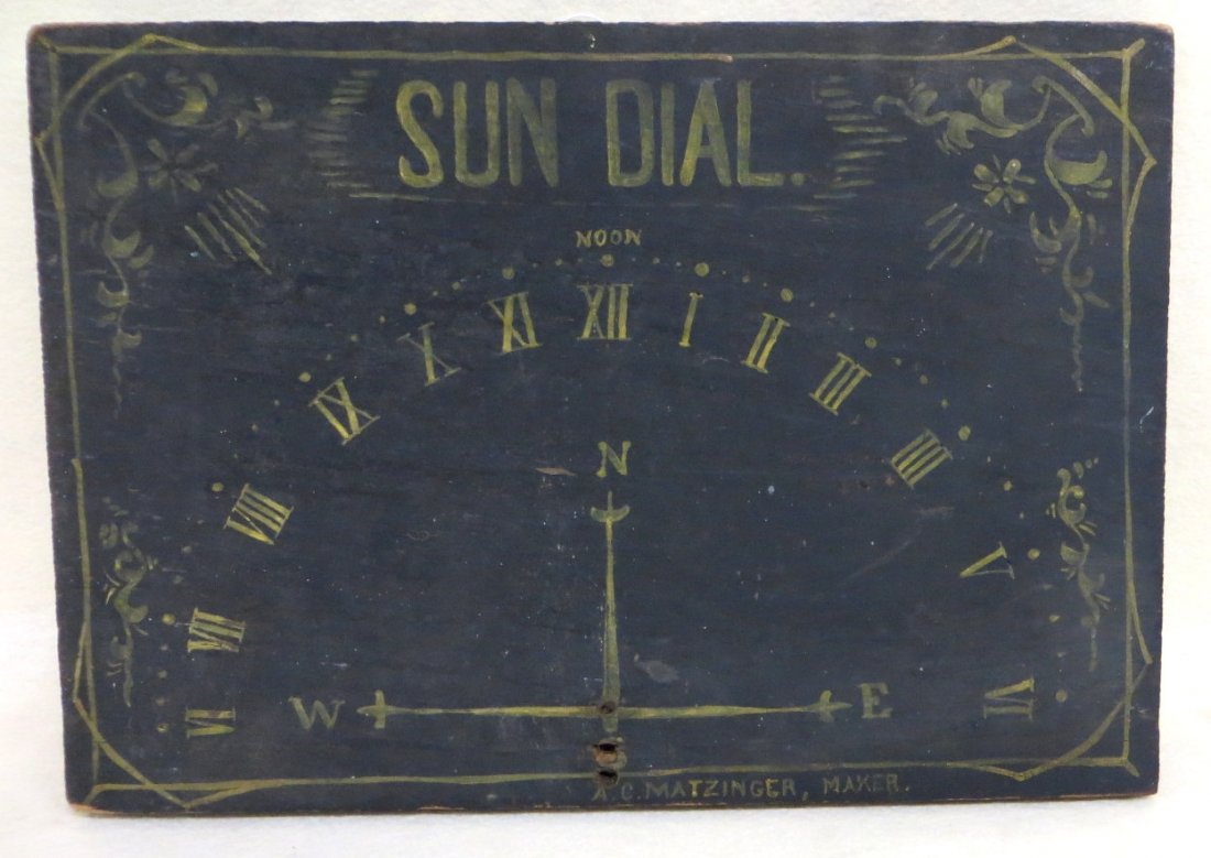 Wooden hand made and painted "SUNDIAL" in original: Wooden hand made and painted "SUNDIAL" in original yellow and black paint - missing nail that would have been used to cast shadow. Signed on base "A.C. Matzinger, Maker" - 12" x 17.25"