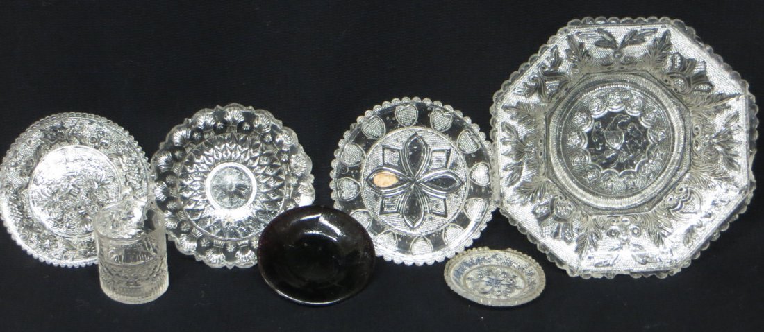 Collection of 7 pieces of early glass including 3 cup: Collection of 7 pieces of early glass including 3 cup plates, colorless child's cup plate with chip to edge, child's amethyst saucer, small shot glass with tiny chip to rim and an unusual octagonal sh