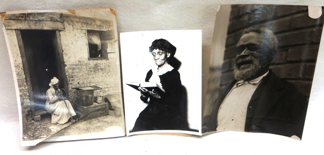Three early 20th century Associated Press photos of: Three early 20th century Associated Press photos of former slaves. Two 8" x 10", 6" x 8" - one photo with large tear across bottom and tears at the top, photo of elderly man with tear on bottom right 
