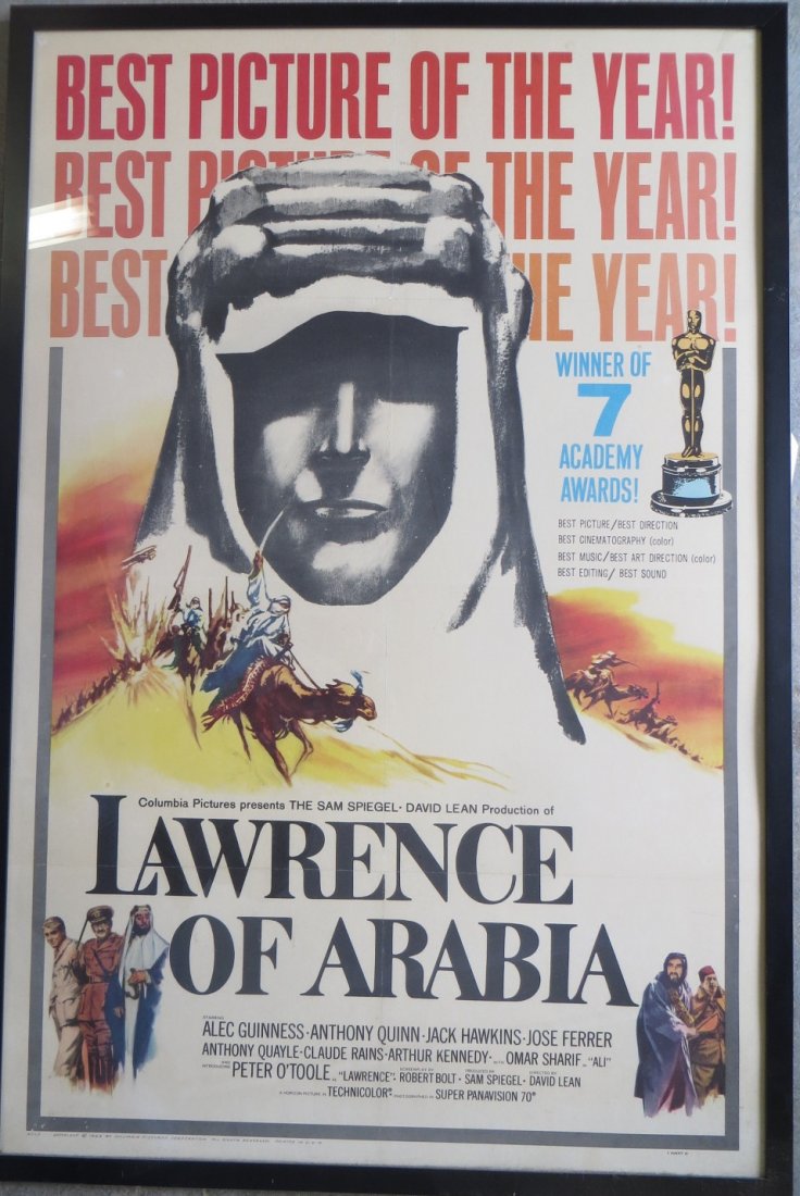 Large folio movie poster "Lawrence of Arabia" - Best: Large folio movie poster "Lawrence of Arabia" - Best Picture of the Year - copyright 1963 - 26.5" x 40.5" - framed. Several fold marks, thumb tack marks but otherwise very good condition.