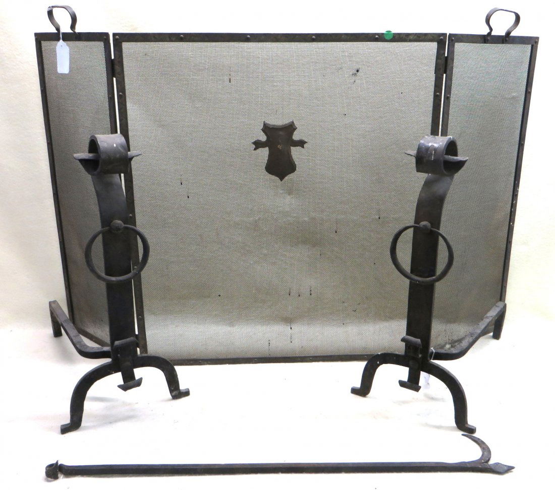 Four hearth items including Arts and Crafts style iron: Four hearth items including Arts and Crafts style iron fireplace screen, scrolled andirons and a poker. All early 20th century.