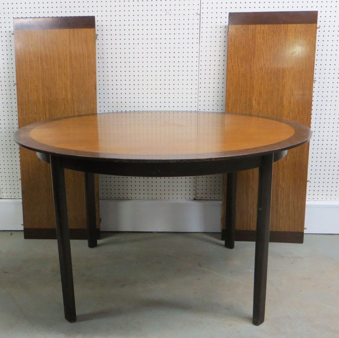 Signed Dunbar Furn. Corp. Dining Room table with two: Signed Dunbar Furn. Corp. Dining Room table with two 18" leaves - table is oak with banded walnut border - 50" x 50" closed. Shows only minor wear and is in very good overall condition.
